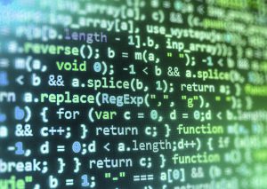 Software developer programming code on computer. Abstract computer script source code.